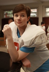 'Glee's openly gay character Kurt in football uniform